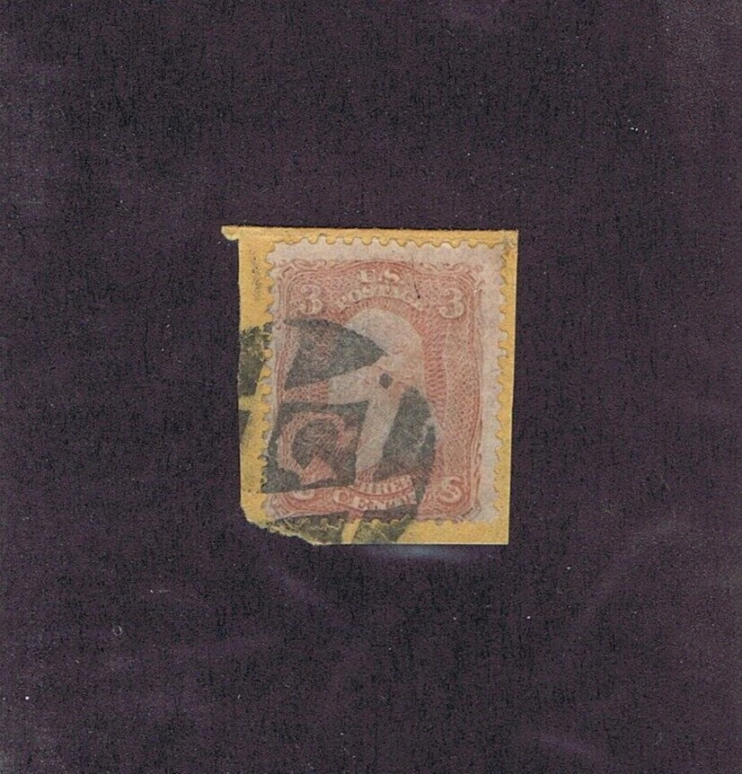 Used stamp on paper fragment